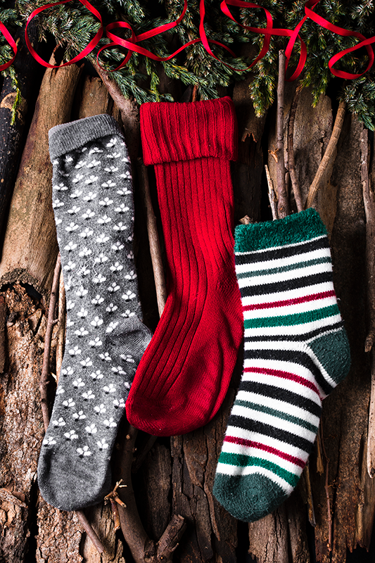 Christmas poster with festive socks design - TenStickers