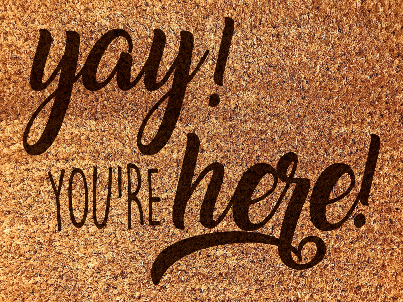 Warm welcome phrase entrance hall vinyl rug - TenStickers